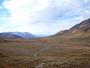 The road to Mt. McKinley. That is Mt. McKinley peaking through the clouds.